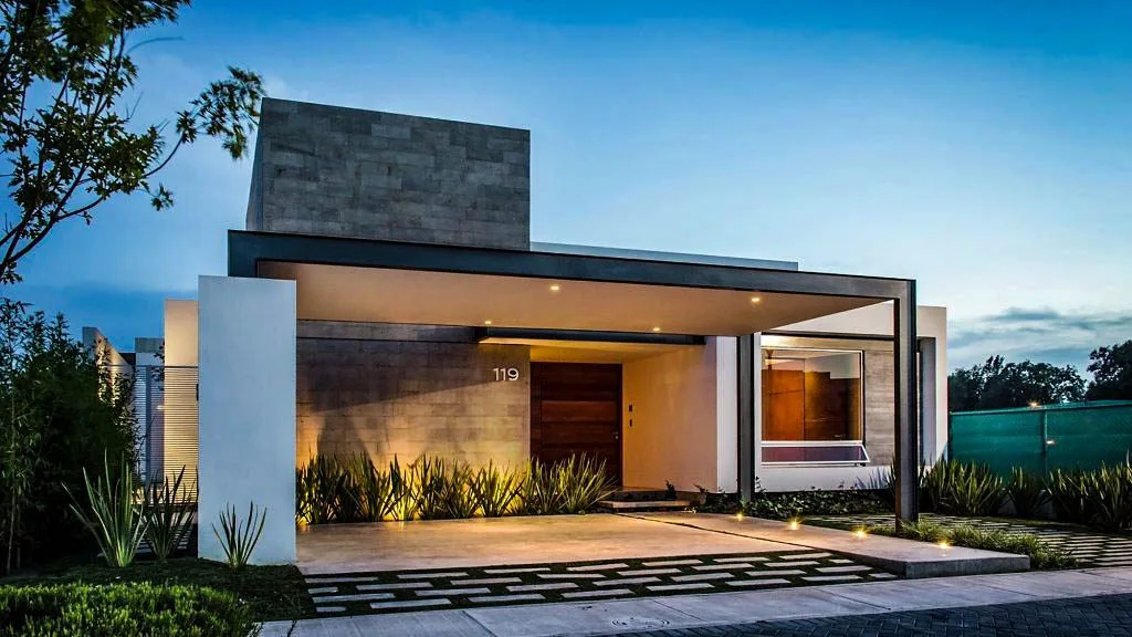 Fotografía de vivienda familiar tamaño premium moderna con garage exterior